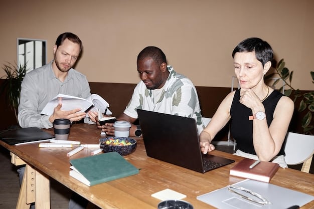 An image showing diverse people sitting around a conference table, engaging in a lively discussion, with documents scattered around. The atmosphere is collaborative and engaged.
