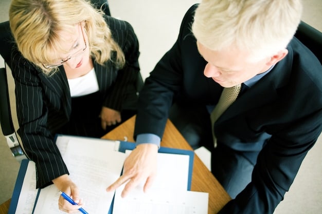 Two people in a business meeting, analyzing documents and discussing the details of a contract, emphasizing collaboration and mutual understanding.