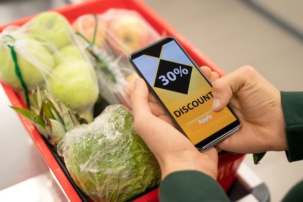 A close-up of a smartphone screen displaying a digital coupon app, with various grocery item discounts visible.