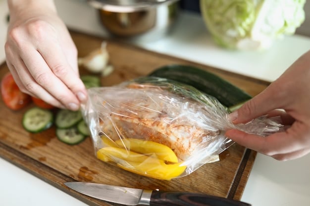 Close-up of hands using a vacuum sealer to package a piece of steak. The vacuum sealer is removing air from the bag, creating a tight seal.