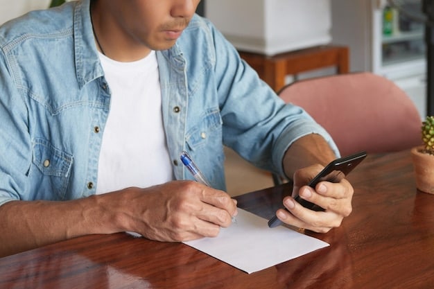 A person on the phone, holding a bill, and highlighting numbers with a pen, indicating an active negotiation process.