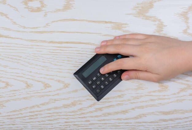 A person's hand pressing a calculator button with numbers displayed, symbolizing smart financial decisions and savings.