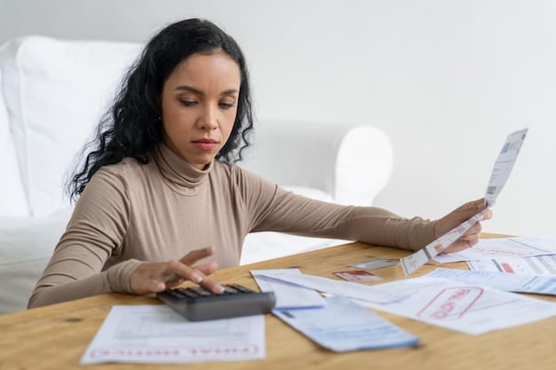 A person carefully examining a credit card statement and a calculator, indicating detailed financial review and debt management.