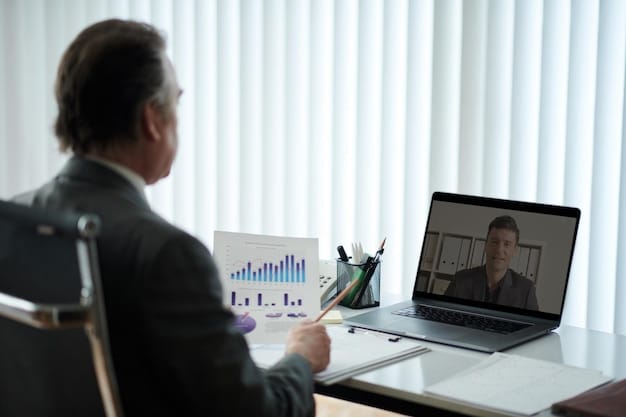 A person on a video call with a financial advisor, discussing documents and charts on screen, symbolizing an expert consultation for better financial planning.