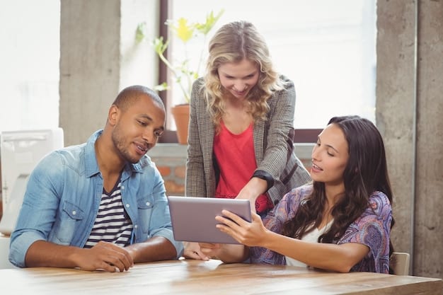 A diverse group of people (family, friends) gathered around a table, actively discussing and learning about financial security from one another, with a tablet displaying a cybersecurity website.