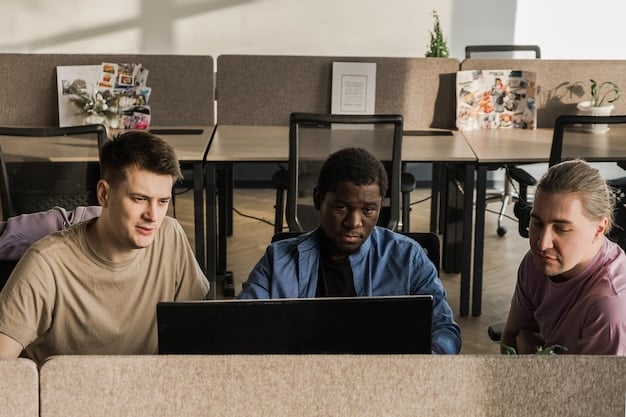 A diverse group of young students engaged in a coding workshop, looking focused and excited while working on laptops, illustrating technology education.