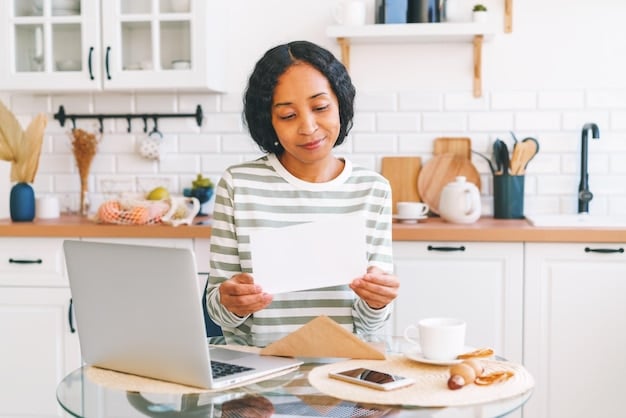 A brightly lit, medium shot of a person clipping coupons while sitting at a kitchen table. The table also holds a grocery store flyer and a shopping list. The focus is on the person's hands and the act of preparing for a budget-conscious shopping trip.