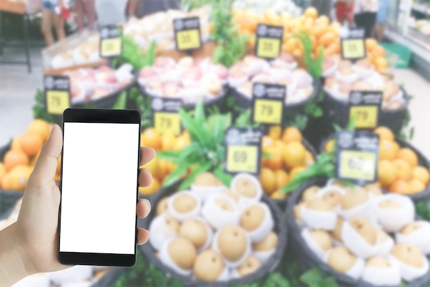 A close-up shot of a smartphone screen displaying a grocery store's mobile app with several digital coupons available for clipping. The app interface is clean and user-friendly, showing various product categories and potential savings figures clearly displayed. The image highlights the ease of browsing and selecting digital coupons while aiming to Maximize Your Savings: A Guide to Using Digital Coupons at Major Grocery Chains.