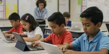 Students using digital devices in a modern classroom, symbolizing improved digital access.